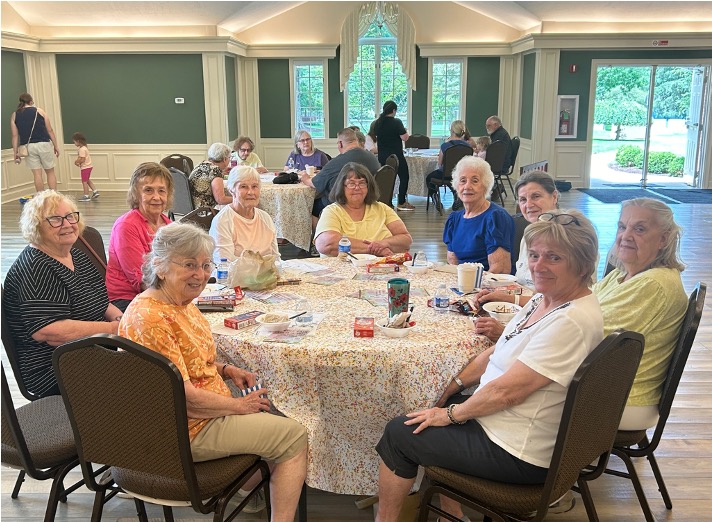 Women at table at civic center
